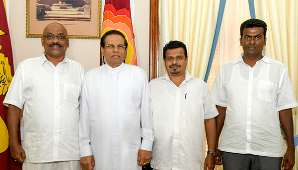 Weerakumara Dissanayaka and Piyasiri Wijeynayake with President Maithripala Sirisena