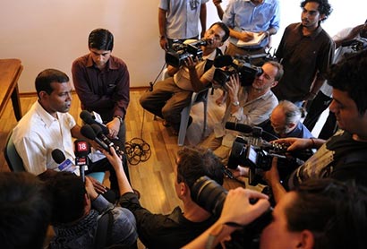 Former Maldives president Mohamed Nasheed speaks to reporters in home in Male