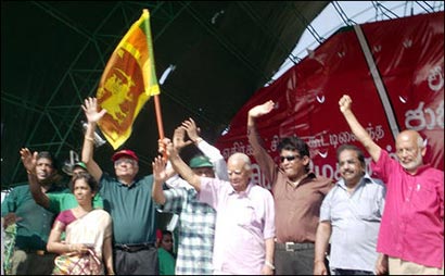 Sambanthan waving lion flag with Ranil Wickramasinghe