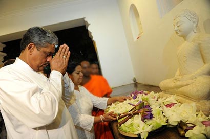 Sarath Fonseka at a temple