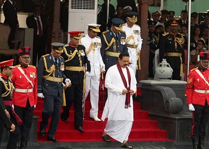 Sri Lankan president Mahinda Rajapaksa inspect the war victory military parade to commemorate the third anniversary of the end of the civil war