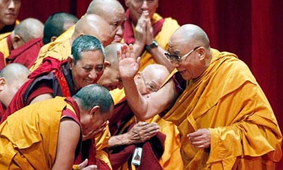 The Dalai Lama greets Buddhist monks