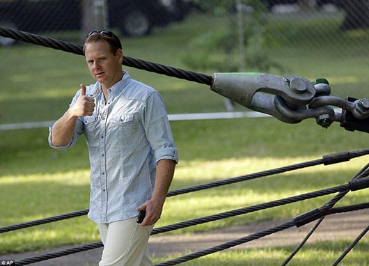 Nik Wallenda walks across the Niagara Falls in an attempt to be the first man ever to complete the walk