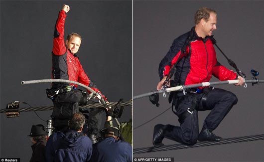 Nik Wallenda walks across the Niagara Falls in an attempt to be the first man ever to complete the walk