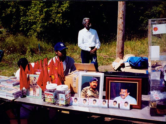 A 2001 file photo shows a donation container and Tamil flags displayed for sale at the renovated Hindu Temple Society in Richmond Hill. 