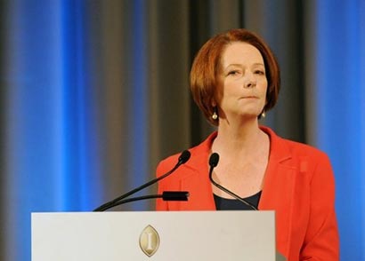 Australian Prime Minister Julia Gillard (pictured on August 7) defended her decision to send asylum-seekers, arriving by boat, to Pacific islands, saying it was a 'tough' policy but could save lives