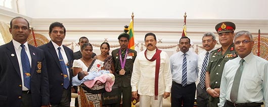 Lance Corporal Pradeep Sanjaya met President Mahinda Rajapaksa