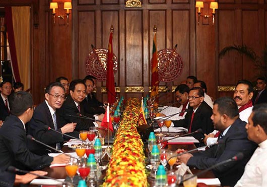 Mr. Wu Bangguo, chairman of the Standing Committee of China's National People's Congress, and Sri Lankan President Mahinda Rajapakse