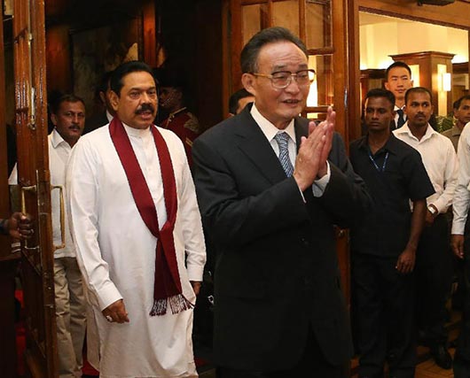 Mr. Wu Bangguo, chairman of the Standing Committee of China's National People's Congress, and Sri Lankan President Mahinda Rajapakse