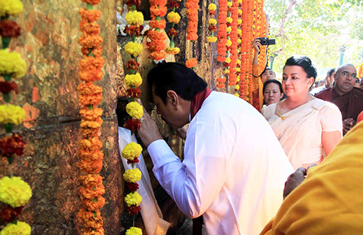 President Rajapaksa visits Bodh Gaya, India amid protests