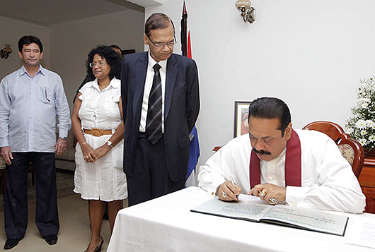 President Rajapaksa pays respect to Late Venezuelan President Hugo Chavez
