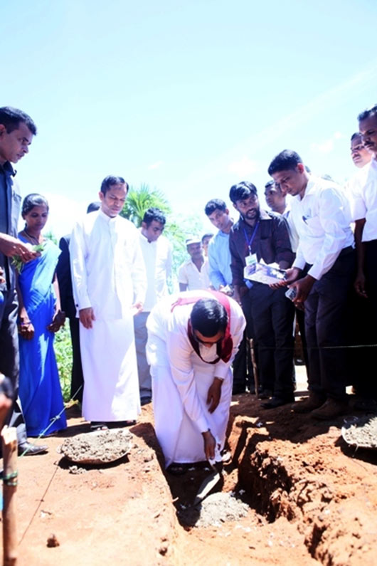 Basil at Indian housing project inauguration ceremony