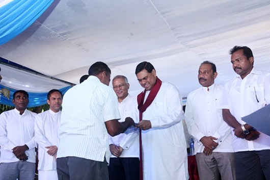 Basil at Indian housing project inauguration ceremony