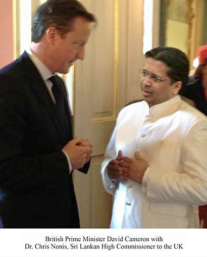 BRITISH PRIME MINISTER CAMERON WITH DR CHRIS NONIS