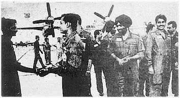 IAF aircrew being congratulated by the ground crew on successful completion of the supply drop after landing back at Bangalore Airport on the evening of June 4th, 1987 