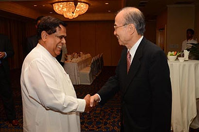 Minister Nimal Siripala De Silva with Yasushi Akashi