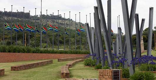 Sri Lanka President Rajapaksa pays last respects to late South Africa leader Nelson Mandela