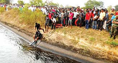 Aralaganwila tractor trailer falls into canal