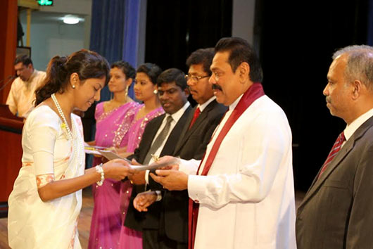 Handing over of letters of appointment to Banking Assistants newly recruited to the People’s Bank at the BMICH in Colombo by President Mahinda Rajapaksa