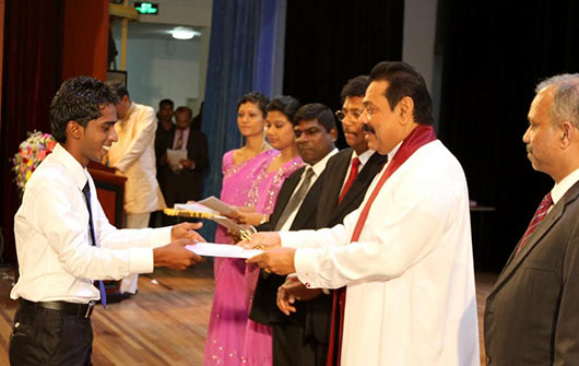 Handing over of letters of appointment to Banking Assistants newly recruited to the People’s Bank at the BMICH in Colombo by President Mahinda Rajapaksa