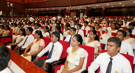 Handing over of letters of appointment to Banking Assistants newly recruited to the People’s Bank at the BMICH in Colombo by President Mahinda Rajapaksa