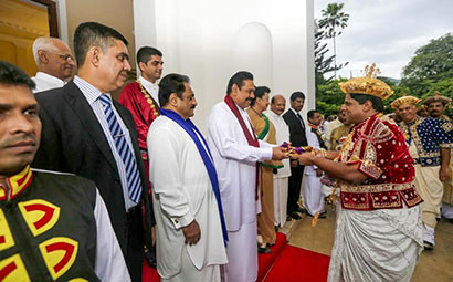 Diyawadana Nilame hands over the Sannasa to the President