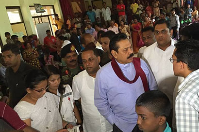 Sri Lanka President Mahinda Rajapaksa inspects landslide victims