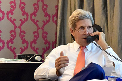 John Kerry over the phone