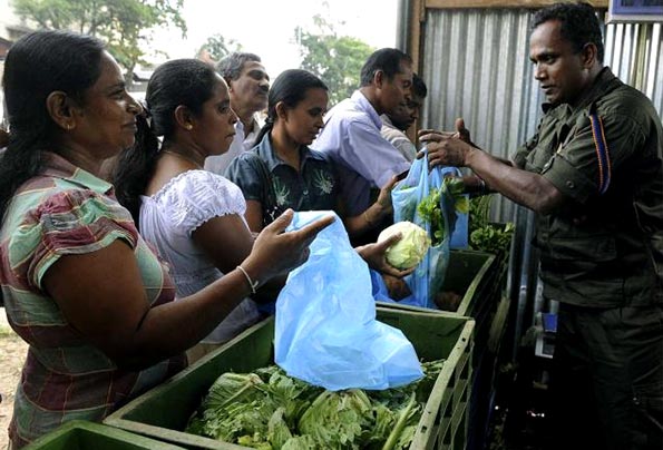 Sri Lanka Army soldier selling vegitable