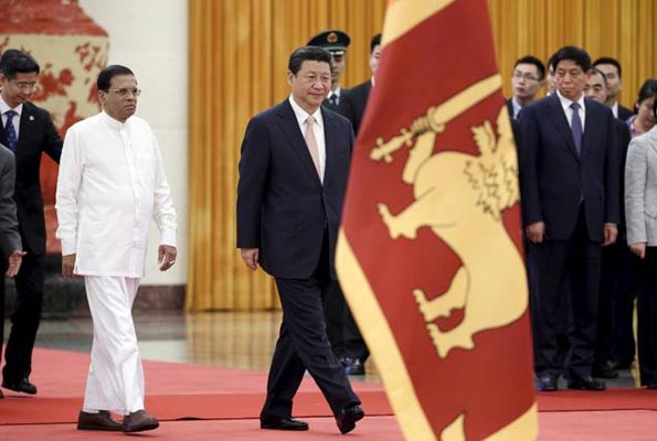 Sri Lanka's President Maithripala Sirisena and China's President Xi Jinping attend a welcoming ceremony at the Great Hall of the People in Beijing