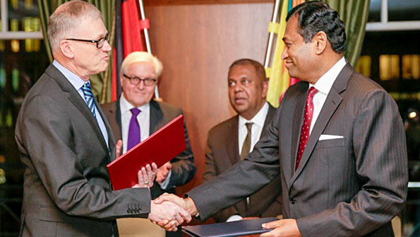 Karunatilake Amunugama signs agreement with Germany