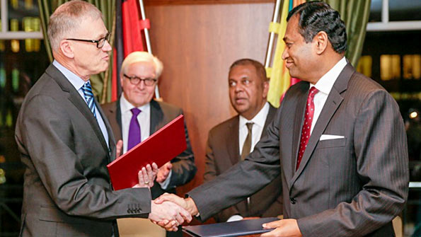 Karunatilake Amunugama signs agreement with Germany