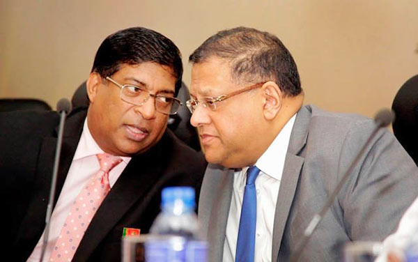 Ravi Karunanayake with Arjun Mahendran