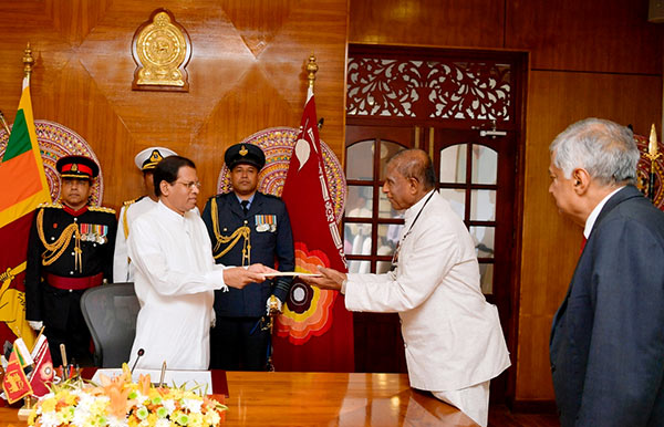 Gamini Jayawickrema Perera take oath as Buddha Sasana Minister