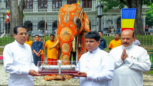 Sri Lanka President Maithripala Sirisena offered a Tusker elephant named Pulatisi Raja, to the Temple of the Sacred Tooth Relic - Sri Dalanda Maligawa