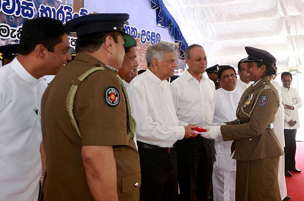 Prime Minister Ranil Wickremesinghe with Police