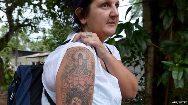 British lady with Buddha tattoo