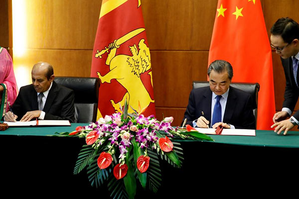 Sri Lanka's Foreign Minister Tilak Marapana and Chinese Foreign Minister Wang Yi