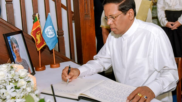 Sri Lanka President signs condolence book on Ms Una Mccauley's demise