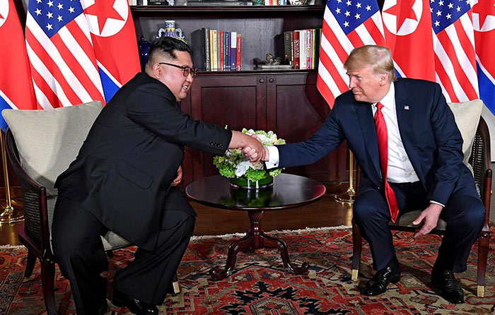 U.S. President Donald Trump with North Korean leader Kim Jong Un - face to face meeting