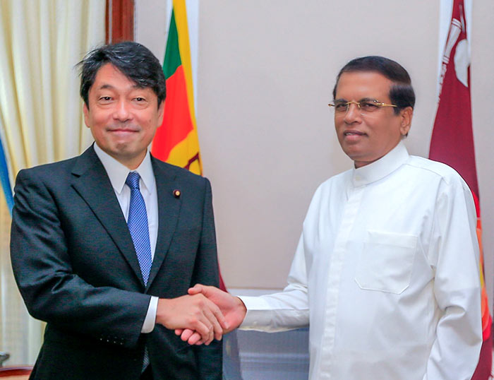 Japan's defence minister Itsunori Onodera with Sri Lanka President Maithripala Sirisena