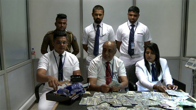 Sri Lankan Passenger apprehended for foreign currency concealed in computer parts