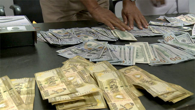 Sri Lankan Passenger apprehended for foreign currency concealed in computer parts