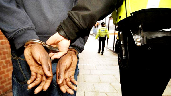 Handcuffed by the police