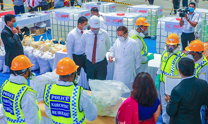 Sri Lanka President Maithripala Sirisena inspects hauls of cocaine which were to be destroyed