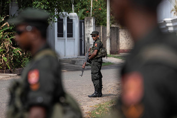 Sri Lanka soldiers stand guard