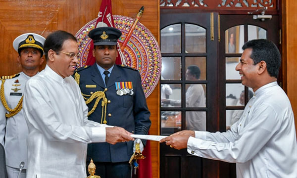 Sri Lanka President Maithripala Sirisena and Minister Buddhika Pathirana