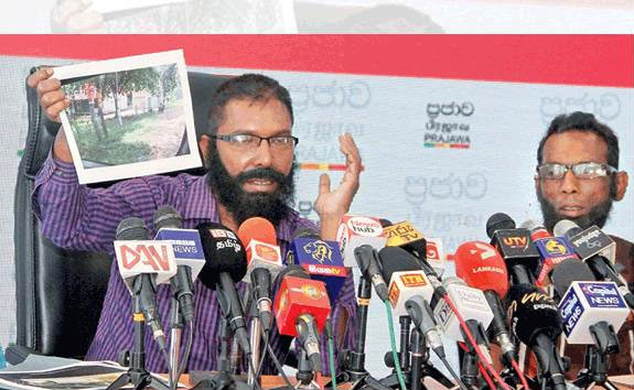 White van drivers of Rajitha Senaratne at a press conference