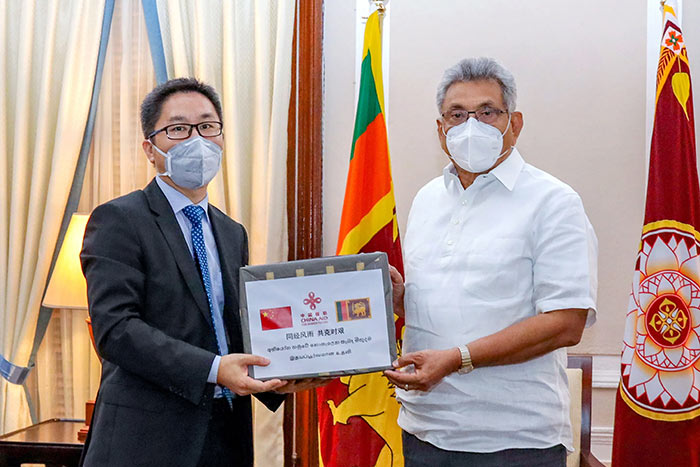 Chinese ambassador Hu Wei and Sri Lanka President Gotabaya Rajapaksa