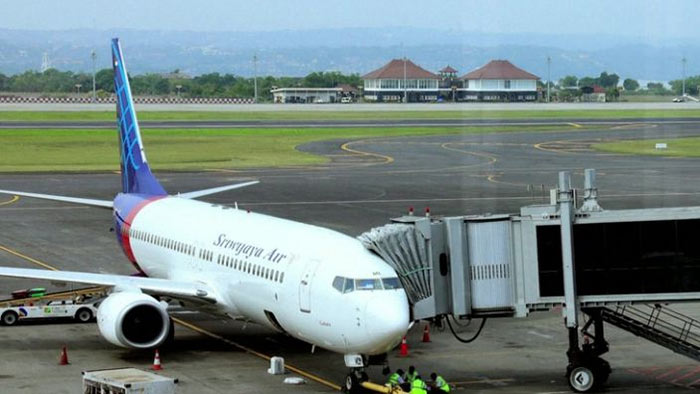 Sriwijaya Air plane on the runway in Jakarta Indonesia